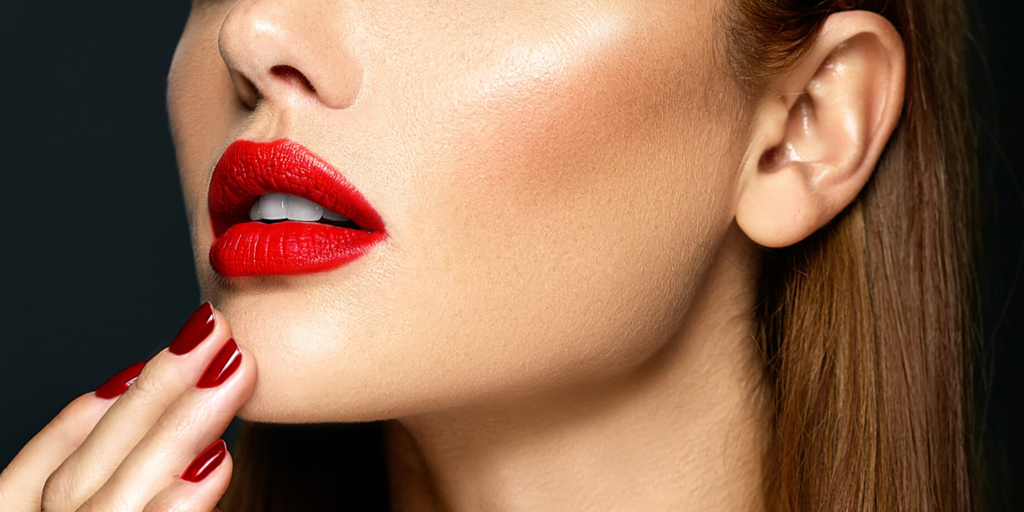 sensual glamour portrait of beautiful woman model lady with fresh daily makeup with red lips color and clean healthy skin face